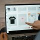 Laptop showing E-Commerce Store selling T-Shirts