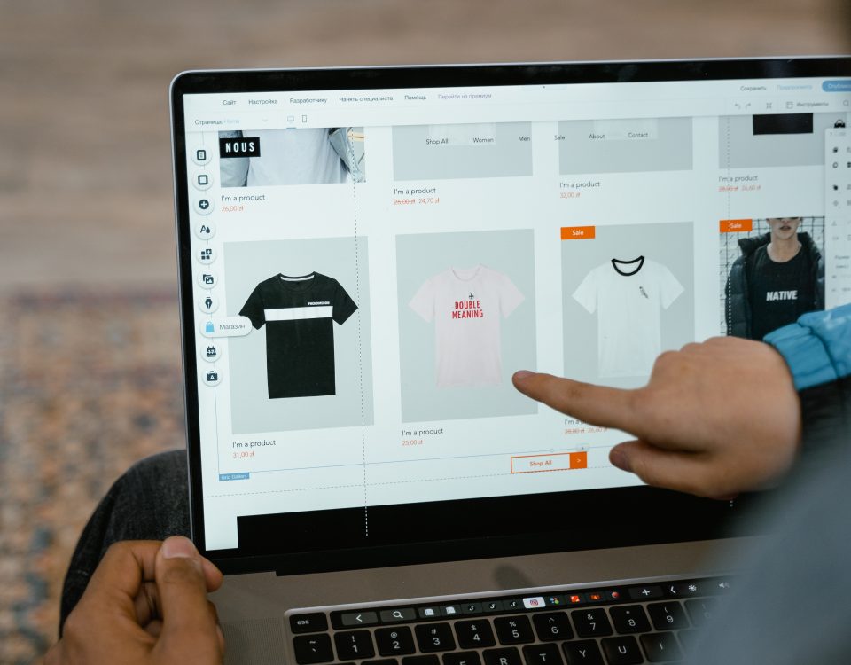 Laptop showing E-Commerce Store selling T-Shirts