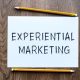 Experiential Marketing - written on paper pencil on table